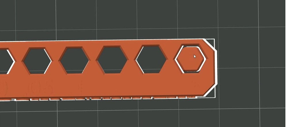 OrcaSlicer tolerance test print showing a base bar with six hexagonal holes at increasing tolerance values from 0 to 0.4mm