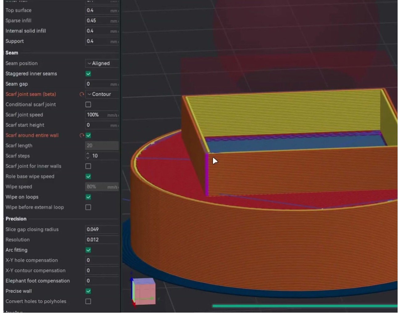 OrcaSlicer sliced preview showing a cube model with the seam panel open and a pink seam line visualization tracing the perimeter start point on each layer