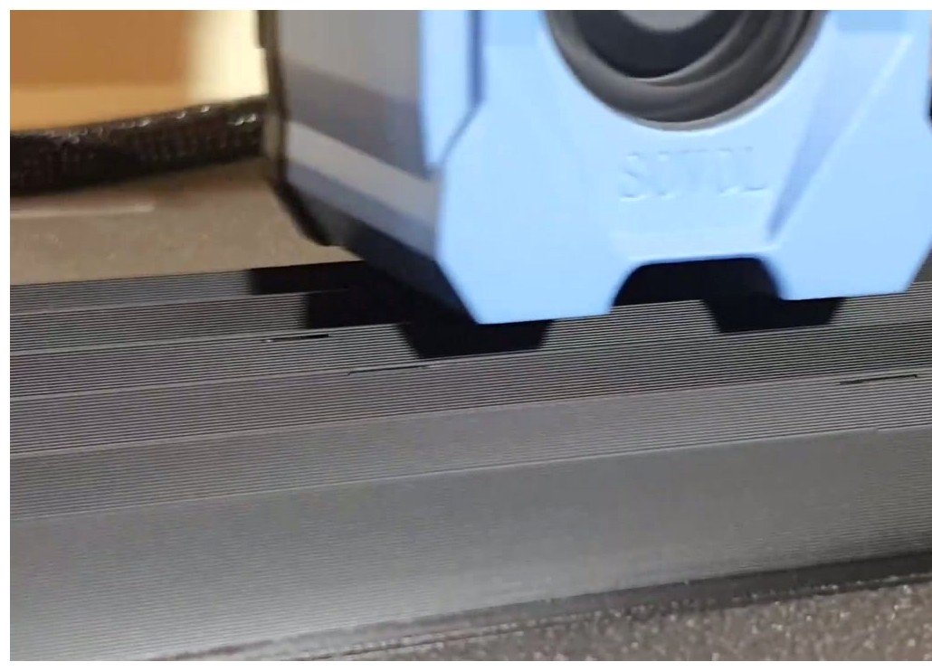 A Sovol 3D printer mid-print laying down PLA test bars